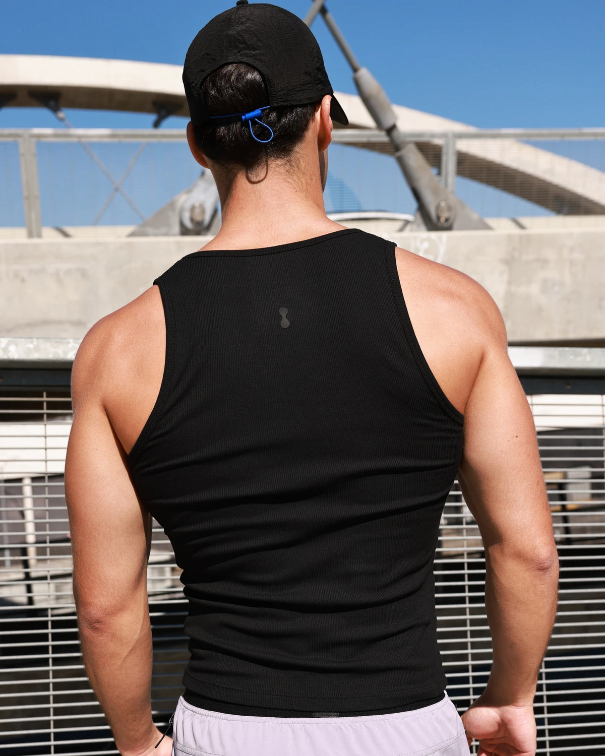 PODIO Core 3-Pack Tanks — black ribbed muscle tank on model