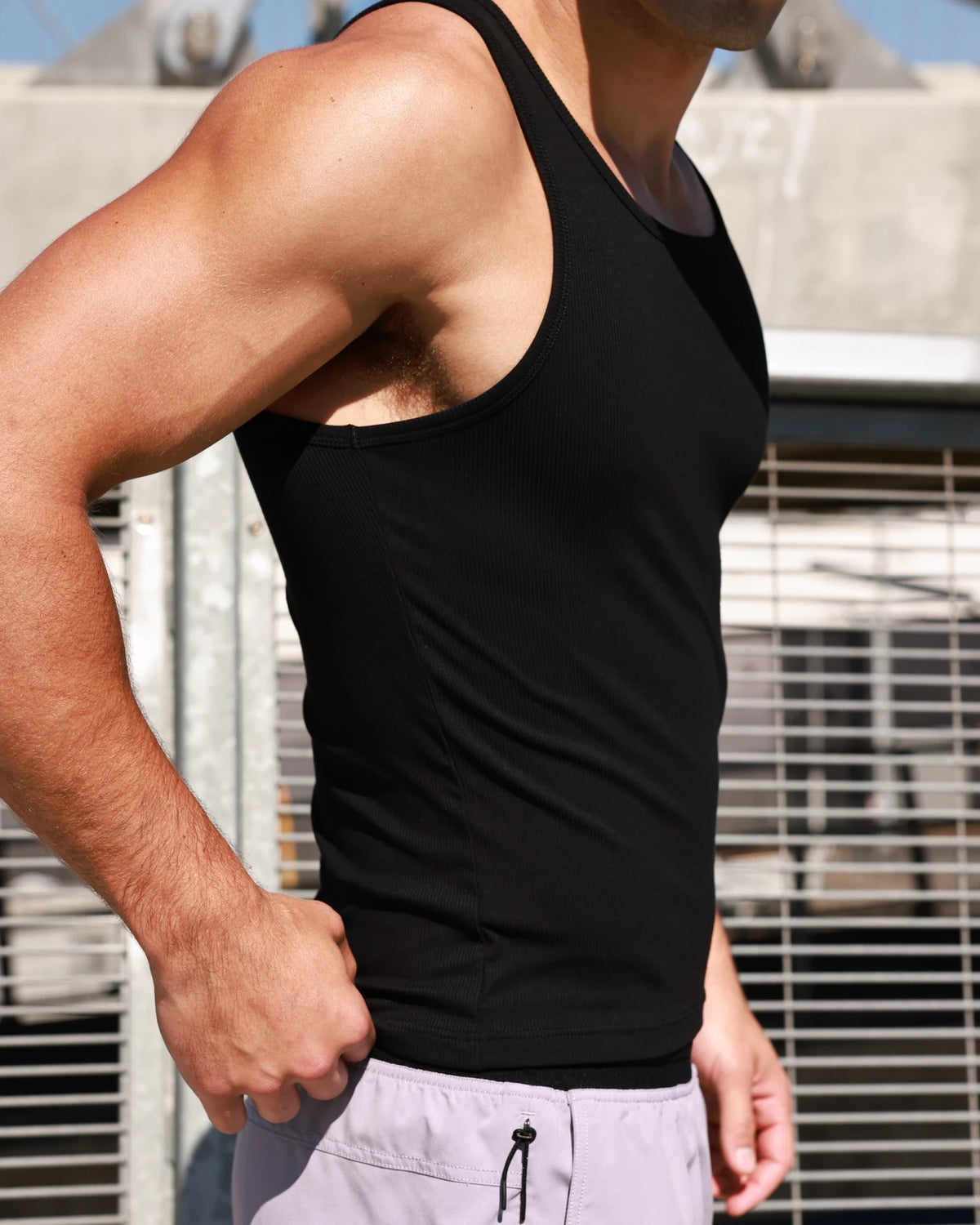 PODIO Core 3-Pack Tanks — black ribbed muscle tank on model