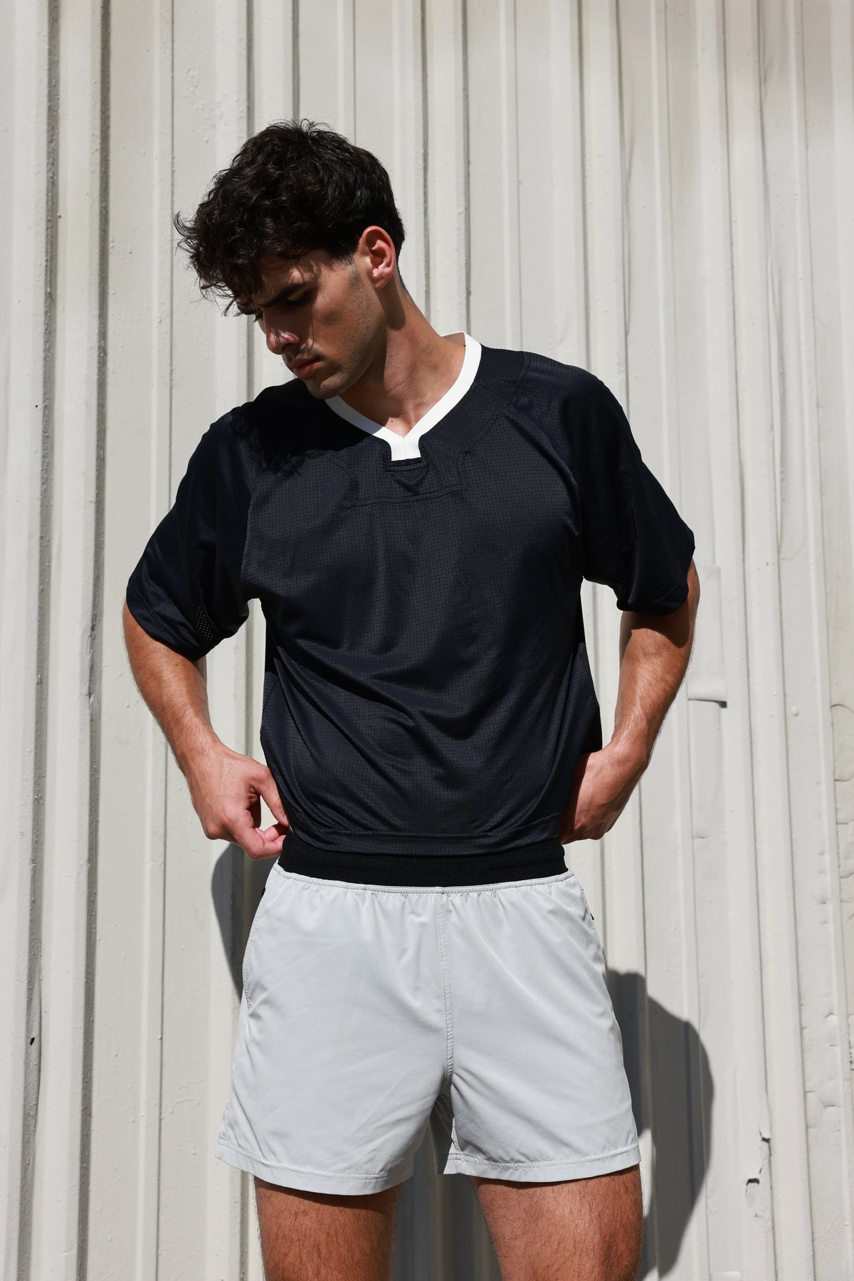 PODIO Midnight Boxy Semi-Cropped Training Tee on model