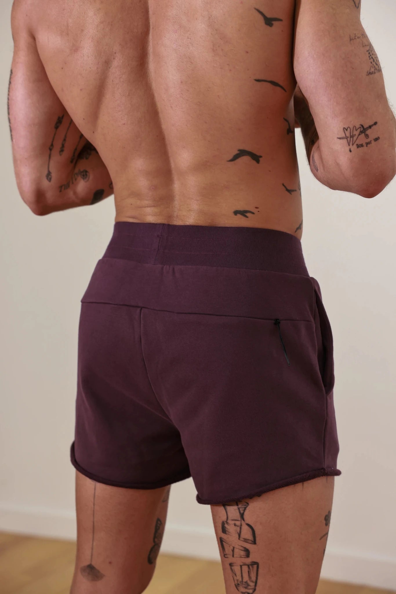 Podio Dusk Lounge Short displayed on a hanger, featuring lightweight fabric and relaxed fit for comfortable casual wear.