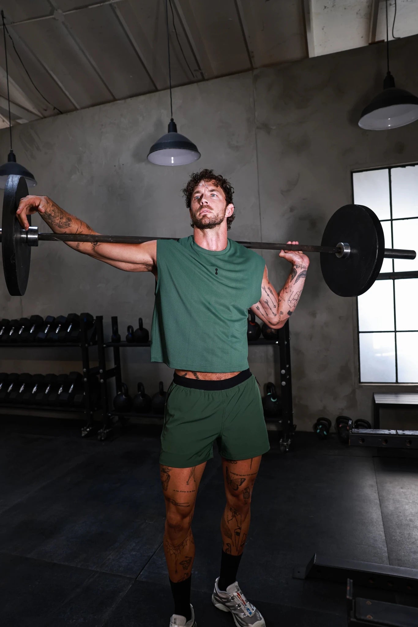 PODIO Grove Active Short in black with elastic waistband, lightweight fabric, and side pockets for comfortable athletic wear.