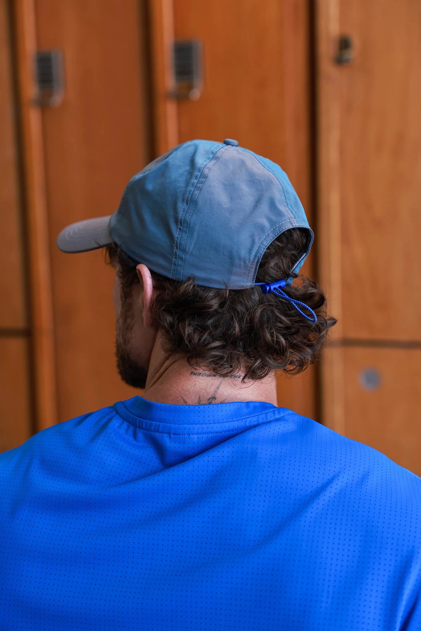 Metal hat with Prism Tide design by PODIO, featuring a sleek, shiny finish and stylish, modern appearance.